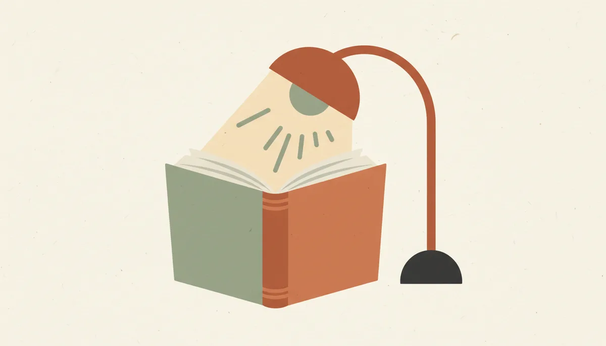 Illustration of an open book under a reading lamp